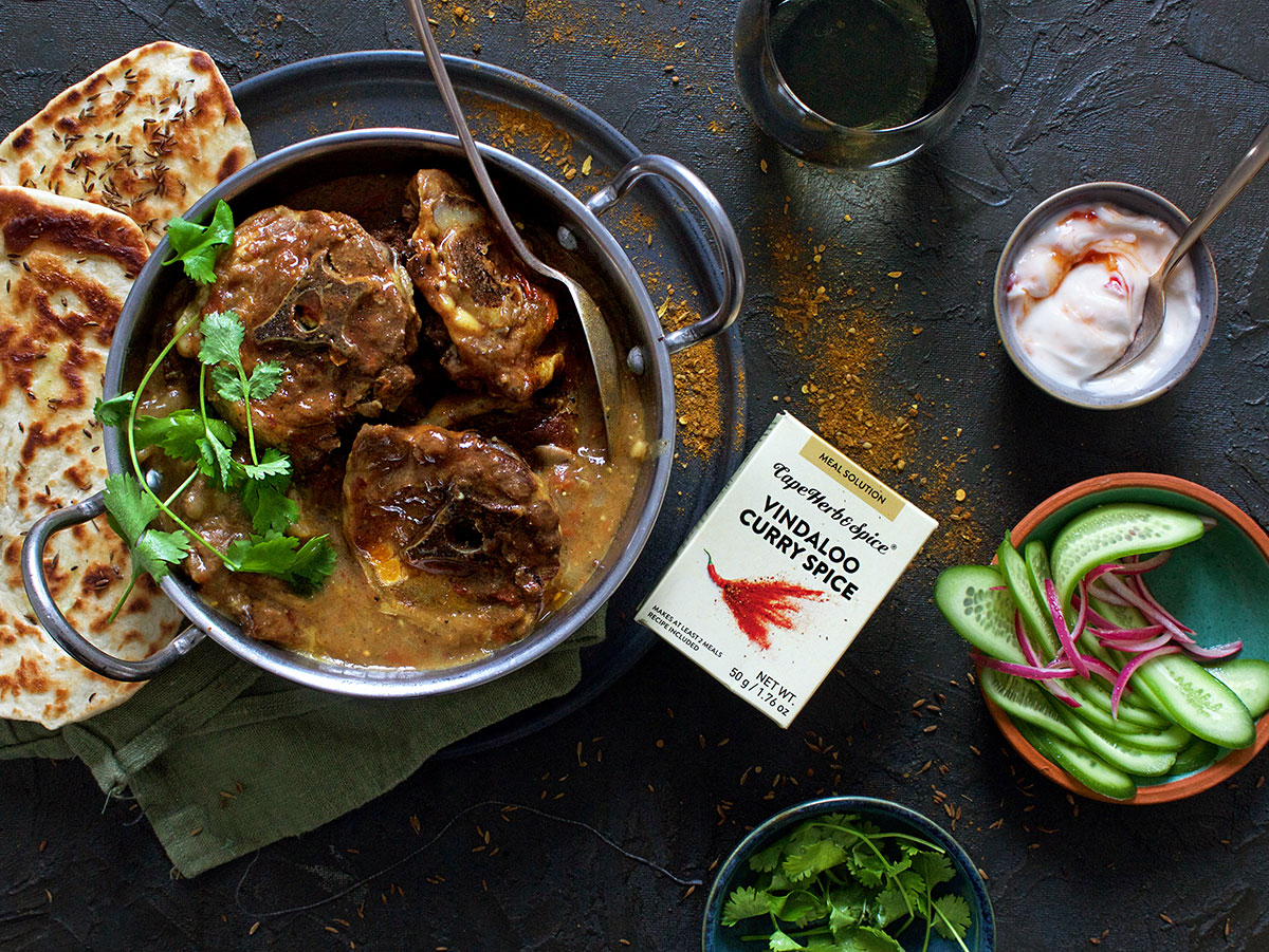 Lamb neck vindaloo with garlic & cumin naan